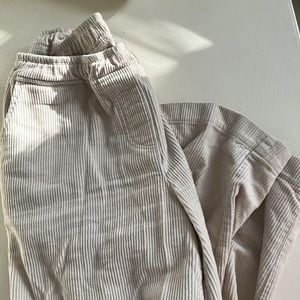 Cream elastic corduroy pants. Size M. Wide leg. No zipper. No buttons.
